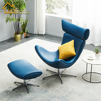 Chaises de salon super confortables, fauteuil pivotant en cuir, fauteuil occasionnel Boconcept Imola bleu