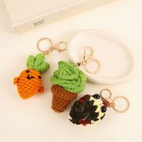 Porte-clés en forme de carotte en crochet tricoté, mignon, pendentif pour sac à dos, en fil Grass Dango, design anime d'Asie du Sud-Est, en métal tendance