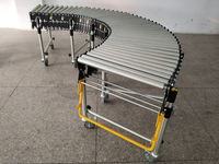 Convoyeur à rouleaux en acier au carbone flexible/extensible par gravité pour entrepôt logistique, rouleaux de 50 mm, capacité de charge de 80 kg/m, 15,3 m