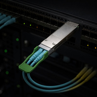 Modul Transceiver Optik 100G QSFP28 LR4 FTTH Panjang Gelombang 850nm Transmisi hingga 100m Konektor MPO 12-Serat Serat Multimode MMF