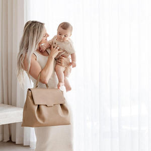 <span class=keywords><strong>Bolsa</strong></span> Organizadora de Pañales de Cuero Genuino, Nueva, Gran Capacidad, para Almacenamiento de Artículos de Bebé, Bolso de Mano para Mamá, Personalizable con Etiqueta Privada, Fabricación OEM - Product Image 3