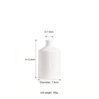 Vases diffuseurs modernes en céramique noire et blanche, mini-bouteilles diffuseuses personnalisées avec bâtonnets, en gros pour la décoration intérieure