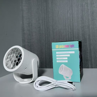 Lampe de projection LED RVB pas chère à 16 motifs, projecteur de flocons de neige, lumière colorée pour la décoration de la maison, lumière de fête pour les fêtes