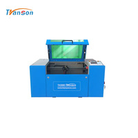 Máquina de Grabado Láser CNC de Sobremesa TRANSON para Cuero, Acrílico, Madera, Goma y Más - Refrigerada por Agua de Alta Calidad de Shandong