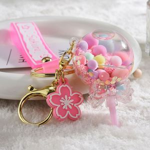 Hot Selling Quicksand Bottle Acrylic Oil Filled Lollipop <b>Key</b> <b>Chain</b> Cute Bag Pendant Car <b>Key</b> Ring Small Gift - Product Image 3