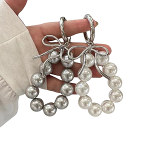 CHENXI Porte-clés exquis avec nœud papillon et perles, accessoires de téléphone, pendentif de sac en imitation perle, porte-clés en métal avec perles - Product Image 1