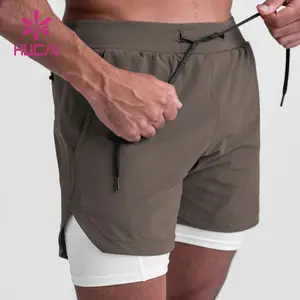Pantaloncini da Jogging da palestra ad asciugatura rapida con logo personalizzato pantaloncini da palestra da allenamento in poliestere a due strati per uomo