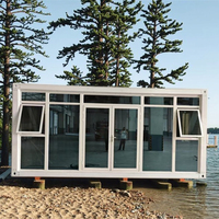 Maison conteneur modulaire préfabriquée en acier de 20 pieds Parc autonome Glamping Logement de revenu Miroirs en verre Cabines Villas
