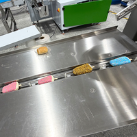 Machine d'emballage horizontale à suivi photoélectrique numérique pour barres chocolatées avec enveloppeuse à bande plastique, haute productivité