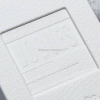 Vêtement de luxe Étiquette volante personnalisée Logo en relief Vêtements en papier blanc mat