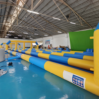 Toboggan aquatique gonflable commercial à double voie, long toboggan aquatique gonflable pour la location en extérieur, dans les jardins et parcs aquatiques