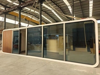 Maison conteneur préfabriquée en acier OEM Apple Pod Cabin 20x40 pieds, design moderne sécurisé, aménagement 1 chambre