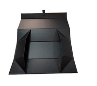 Boîte cadeau pliable et repliable en matériaux recyclés écologiques noirs avec laminage mat et fermeture magnétique
