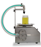 Remplisseur de pesage semi-automatique Échelle de sauce au miel Machine de remplissage de liquide oral Machine de remplissage de table