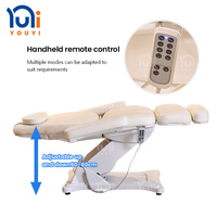 Table de massage électrique blanche réglable pour esthéticienne moderne avec 4 moteurs et lit de spa pour cils, idéale pour salon