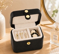 Mini boîte à bagues en cuir PU avec double fermoir, petit organiseur de boucles d'oreilles, étui à bijoux portable de voyage pour bagues et clous d'oreilles pour femmes