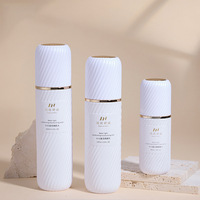 Paquets cosmétiques en verre personnalisés de 40ml 100ml 120ml de bonne qualité flacons à pompe de sérum de lotion blanc à rayures avec pot de crème de 100g