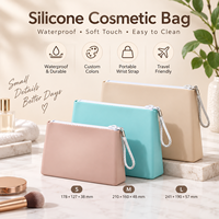 Pochette cosmétique en silicone personnalisée, étanche, pour voyage, avec sangle de poignet, options de logo OEM et fermeture éclair