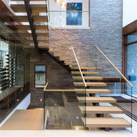 Escalier sur mesure PRIMA de haute qualité en bois avec montants en acier au carbone pour maison