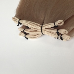 ผมต่อแบบเวอร์จินรัสเซียแท้ เกรด 60a ชนิด Genius Weft สีบลอนด์อ่อน  บางเฉียบ ไร้รอยต่อ น้ำหนัก 100 กรัม  แบบ Double Drawn  ผมแท้ Remy - Product Image 4