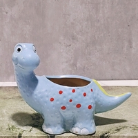 Un vendeur chaud de récipients succulents en céramique de dinosaure