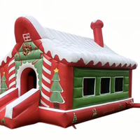 Château gonflable commercial sur le thème de la cabane de Noël pour fêtes de fin d'année