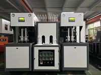 Machine de soufflage de bouteilles en PET semi-automatique avec commande PLC pour le moulage par étirage-soufflage