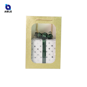 أكياس تغليف هدايا شفافة بتصميم عيون القطط من ورق PP المقوى، مطلية بمادة مائية فاخرة، مصنوعة من مواد معاد تدويرها للأحذية والملابس - Product Image 1