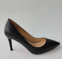 Escarpins élégants noirs en cuir véritable à bout pointu avec semelle rouge signature et talon aiguille fin