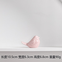 La populaire décoration d'oiseau en céramique inclinable rose d'Instagram