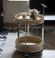 Table d'appoint mobile de luxe italienne avec plateau en cuir, table d'appoint moderne et minimaliste avec rangement