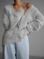 Großhandel Damen Flauschiger Mohair-Cardigan Sexy V-Ausschnitt Übergroßer Flauschiger Knopf-Cardigan Loser Haariger Strickpullover Winter-Oberteil
