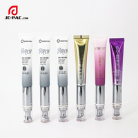 Tube en plastique noir avec tube de baume à lèvres estampage à chaud de 15ml avec applicateur en céramique pour emballage de tube de massage de crème pour les yeux