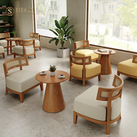 Ensemble de chaises et de tables en rotin design moderne ensemble de chaises de salle à manger en rotin rond en bois massif de luxe pour intérieur