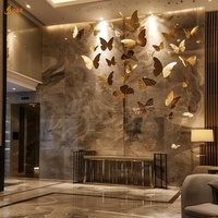 Nouvelle statue d'art mural papillon en or moderne pour l'entrée d'hôtel personnalisée Sculpture murale papillon en acier inoxydable pour la décoration publique