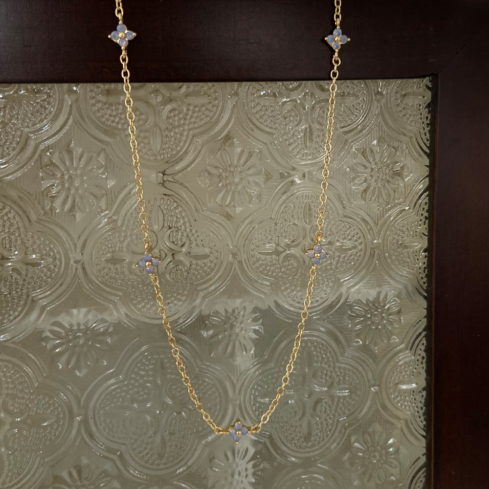 gold blue clover zircon