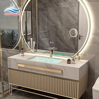 Meja rias kamar mandi mewah dan minimalis model 2026, dilengkapi cermin LED dan wastafel keramik, cocok untuk apartemen
