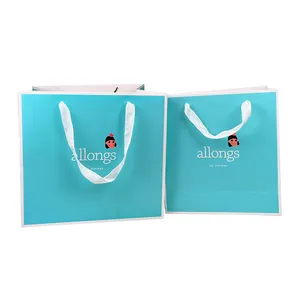 Hot sale Luxury Blue Color Custom Your Own Logo White Card Paper Bag For Gift Packaging With Ribbon Handle