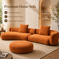 Sofa Modular Boucle Warna Oranye Terang dengan Kain Bertekstur Lembut, Bantalan Dalam yang Luas, Siluet Melengkung, Termasuk Ottoman yang Serasi untuk Rumah