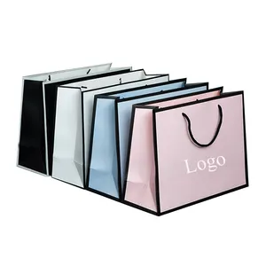 Bolsa de papel con estampado de logotipo personalizado para zapatos, embalaje de venta al por menor, bolsa de papel de lujo para ropa