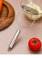 Handmatige roestvrijstalen zilveren fruit- en groentepers, huishoudelijke multifunctionele kinderveilige voedselpers