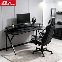 Bureau de jeu à double niveau avec pieds en X et étagère d'extension pour moniteur, idéal pour les salles d'e-sport
