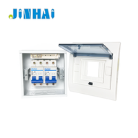 Boîtier de distribution encastré encastrable avec base métallique et porte en plastique mat, pour distribution électrique quatre fils