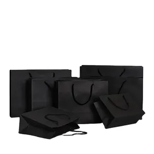 Bolsas de papel con asa para ropa de primera calidad, bolso de compras de joyería de lujo con embalaje negro impreso con logotipo privado personalizado
