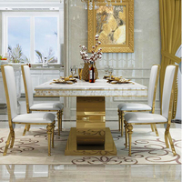 Ensemble de table à manger rectangulaire de grande taille pour 10 personnes, design italien, acier inoxydable doré, plateau en marbre, mobilier royal contemporain du Royaume-Uni et de Dubaï