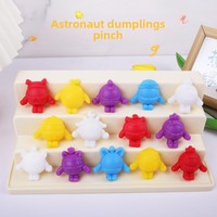 Vente en gros de boulettes d'oeufs mignons transfrontaliers en caoutchouc souple pour garçon astronaute TPR pour filles, jouet de décompression par pincement