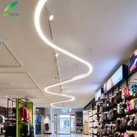 Résille LED incurvée RGBW personnalisée en forme de S éclairage de galerie de bureaux de supermarché lumière linéaire pendante incurvée à LED