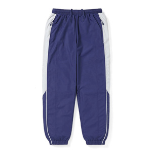Pantalon de survêtement violet pour homme avec taille élastique, bande latérale blanche, cordon de serrage, léger et décontracté, idéal pour l'automne - Product Image 1