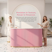Comptoir de réception rose cannelé avec base LED, mobilier de salon pour institut de beauté