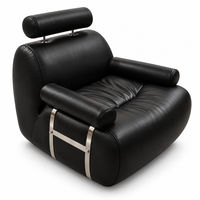 Fauteuil d'appoint en cuir noir rembourré avec appui-tête cylindrique et accoudoirs métalliques pour salon et hôtel